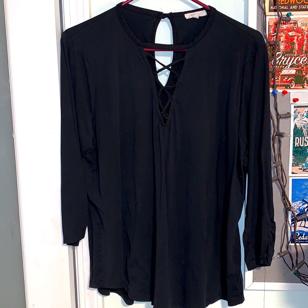 Light weight shirt. Sleeves down to elbow.